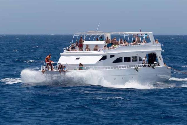 Luxury boat trip in Marsa Alam with snorkeling stops at Marsa Mubarak